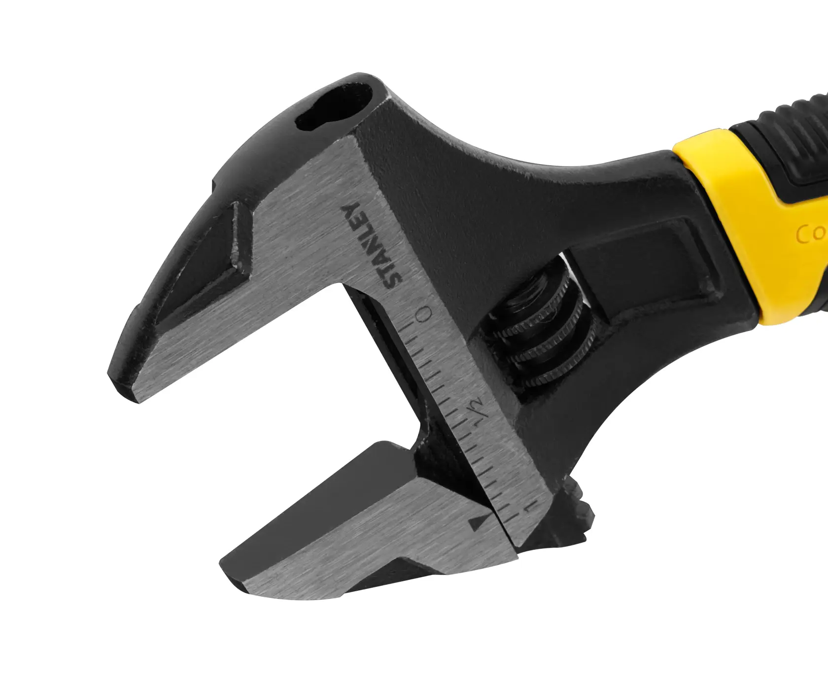 Stanley adjustable wrench with black and yellow handle, close-up of jaw with measurement markings.