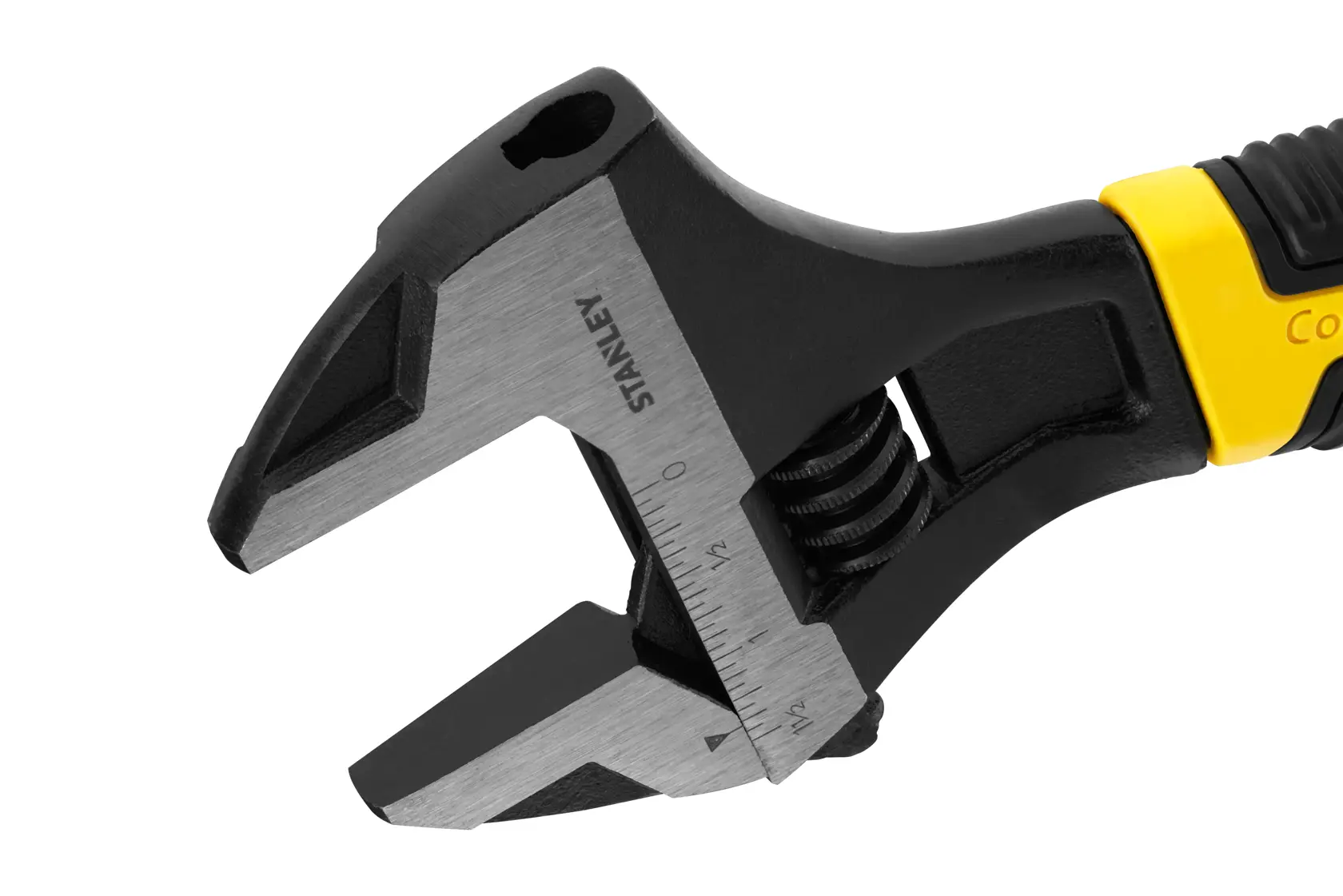 Stanley adjustable wrench with wide jaw and measurement markings, yellow and black handle visible.