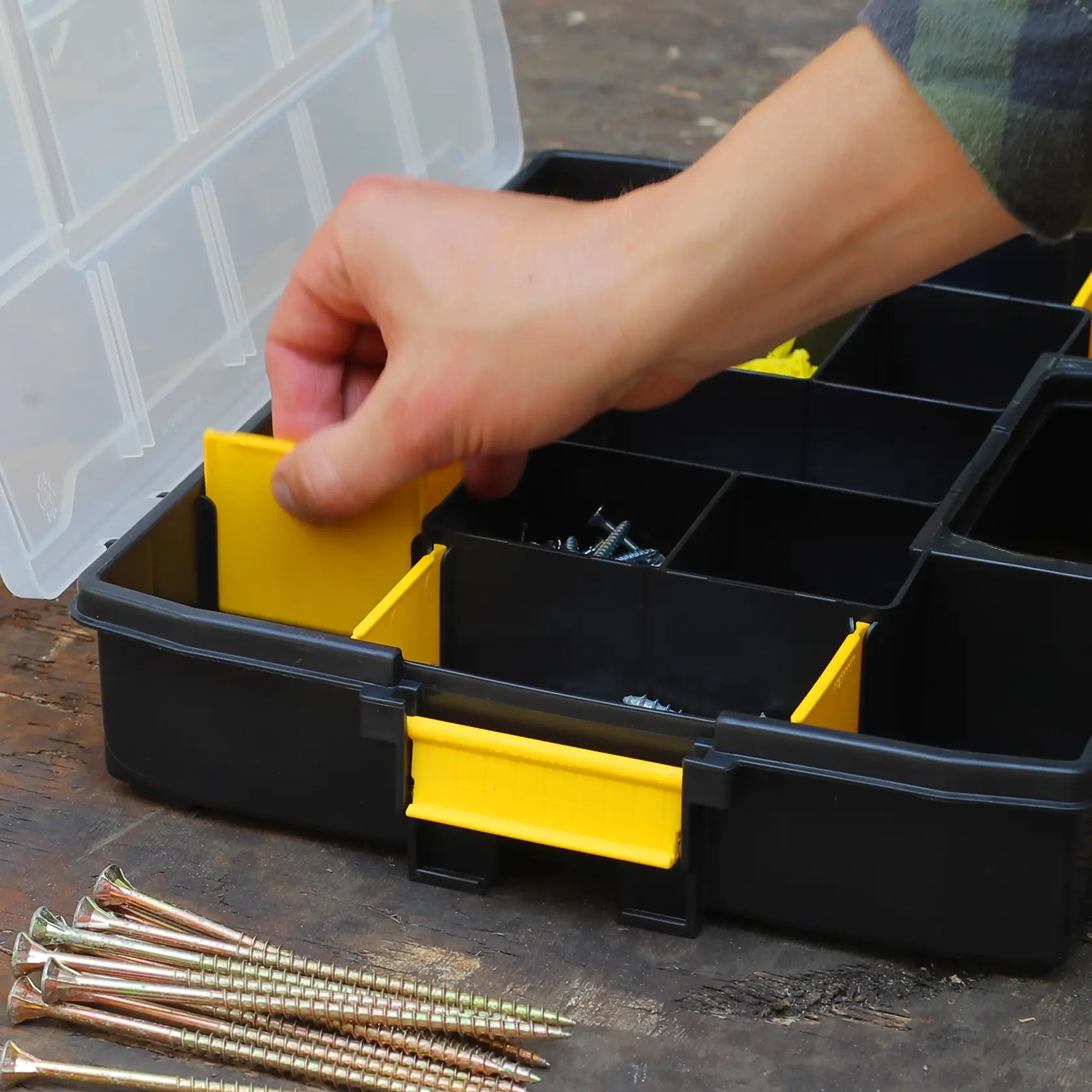 STANLEY 1-97-483 organizer with yellow dividers, screws and nails, photography close-up.