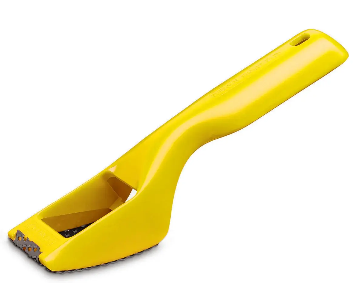 STANLEY 5-21-115 yellow plastic hand rasp, side angle, tool category.